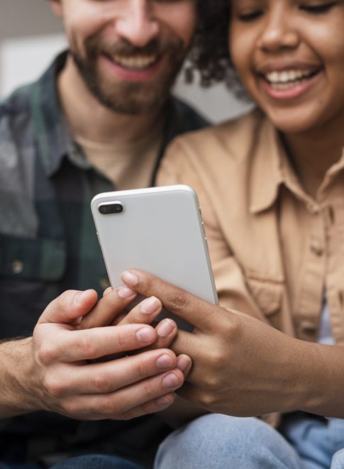 man-woman-hand-holding-phone